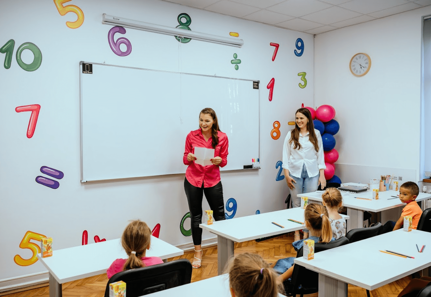 The teacher is conducting the lesson.
