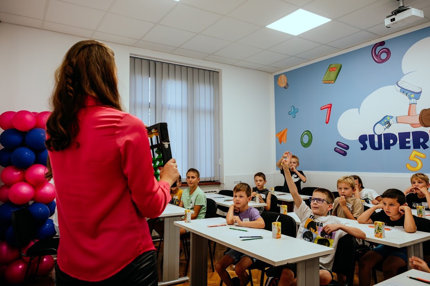 The teacher is explaining the task.